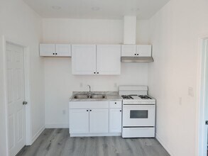 713 3/4 W 57th st in Los Angeles, CA - Building Photo - Building Photo