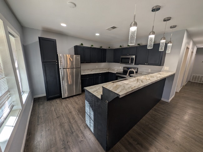 406 Goliad St in Big Spring, TX - Foto de edificio - Building Photo