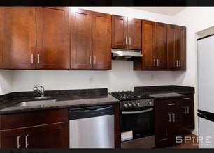 W. 124th St, St Nicholas Ave in New York, NY - Building Photo - Building Photo
