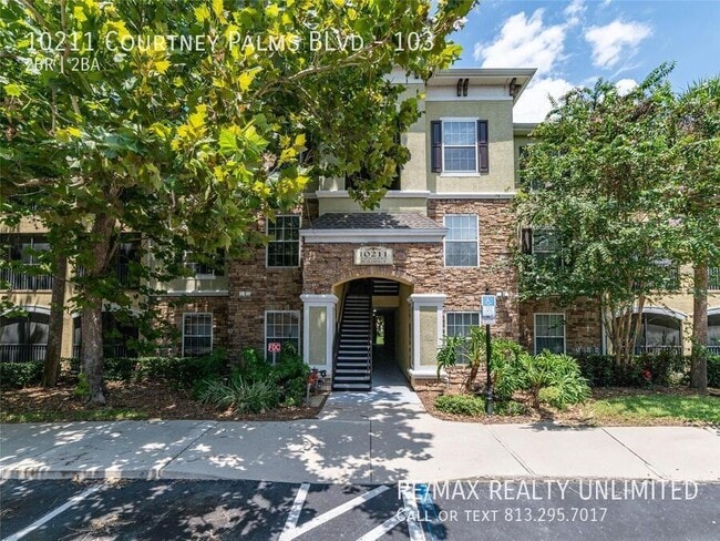 property at 10211 Courtney Palms Blvd