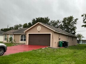 212 SW Yager Pl in Port St. Lucie, FL - Building Photo - Building Photo