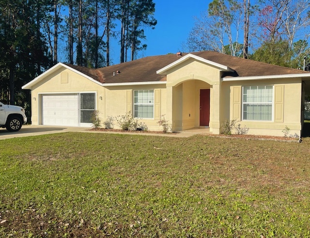 37 Post Tree Ln in Palm Coast, FL - Building Photo