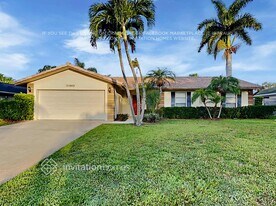 11869 Birch St in Palm Beach Gardens, FL - Building Photo