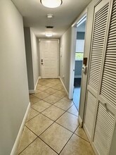 2334 S Cypress Bend Dr, Unit 404 in Pompano Beach, FL - Building Photo - Building Photo