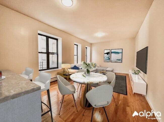 property at 211 E 14th St