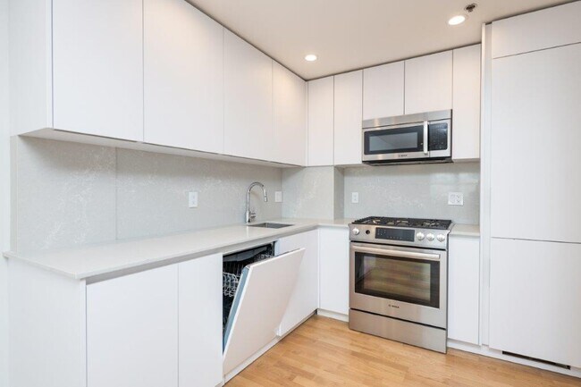 1430 Columbia Rd, Unit 9F in Boston, MA - Building Photo - Building Photo