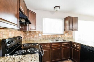 1006 Trifecta Dr in Florissant, MO - Building Photo - Building Photo