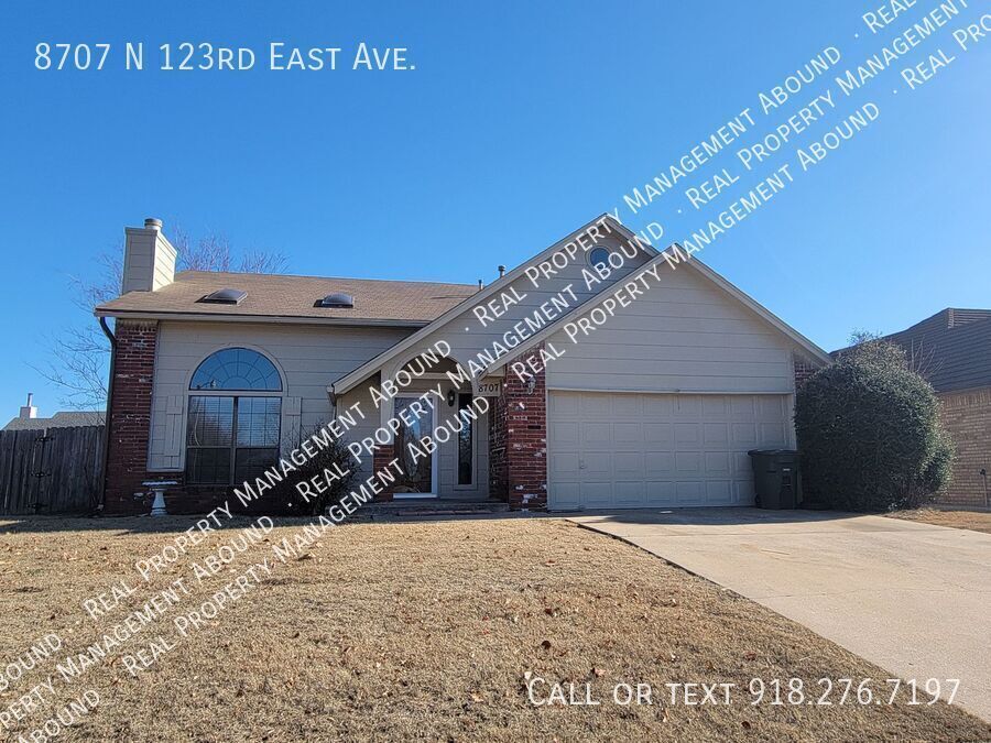 8707 N 123rd E Ave in Owasso, OK - Building Photo