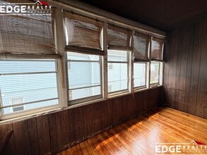 57 Rindge Ave, Unit 1 in Cambridge, MA - Foto de edificio - Building Photo