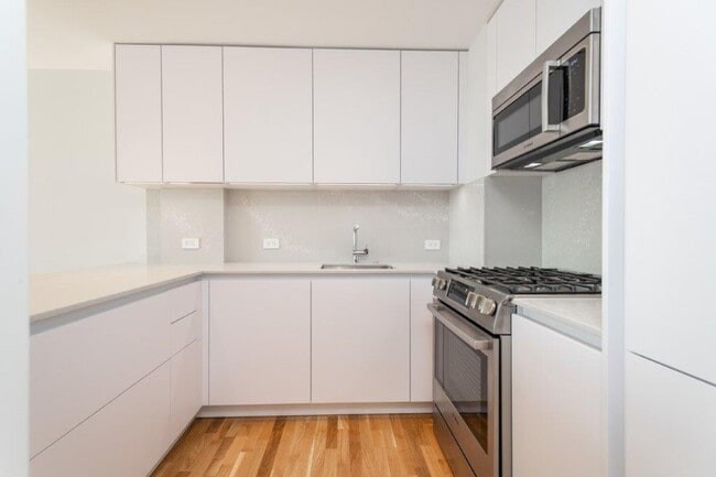 1424 Columbia Rd, Unit 15F in Boston, MA - Building Photo - Building Photo