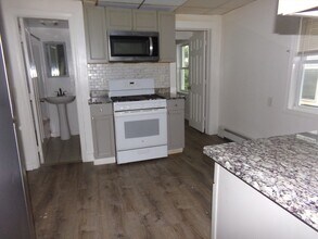 716 Lawrence St in Lowell, MA - Building Photo - Building Photo