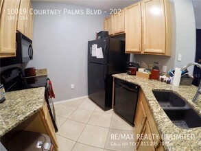 10019 Courtney Palms Blvd in Tampa, FL - Building Photo - Building Photo