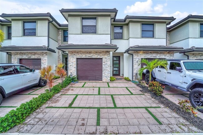 property at 15850 NW 91st Ct