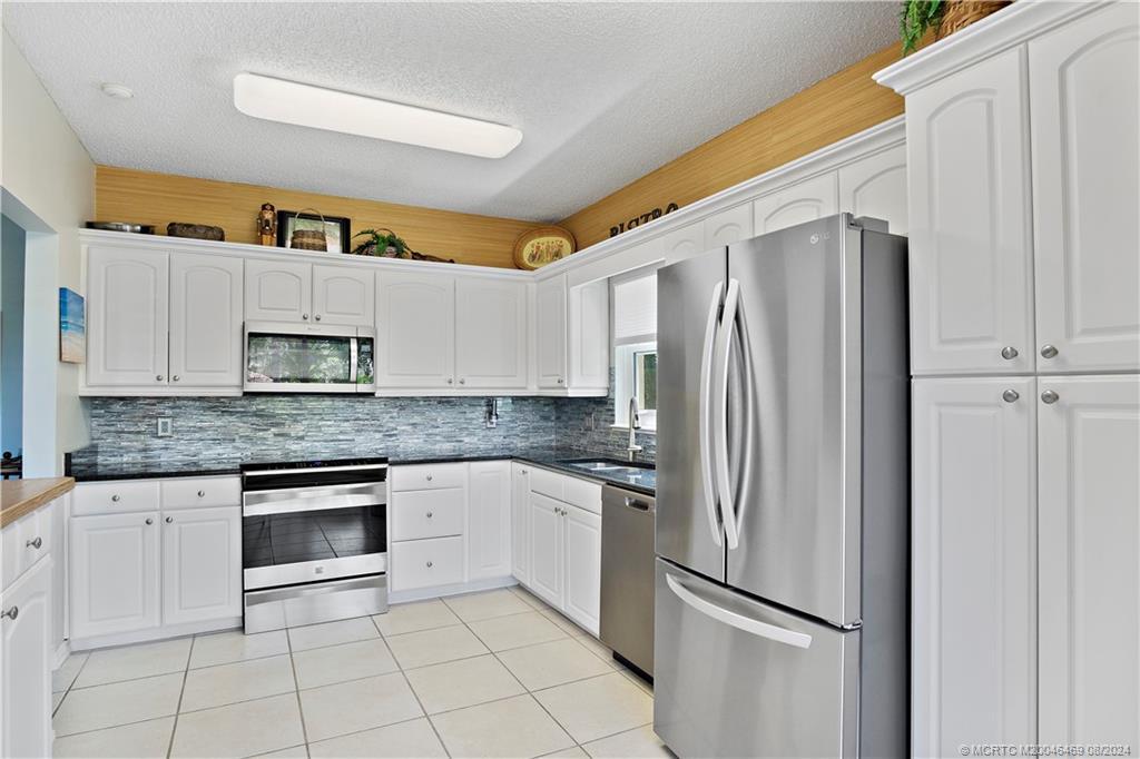 12457 Harbour Ridge Blvd-Unit -2-7 in Palm City, FL - Foto de edificio