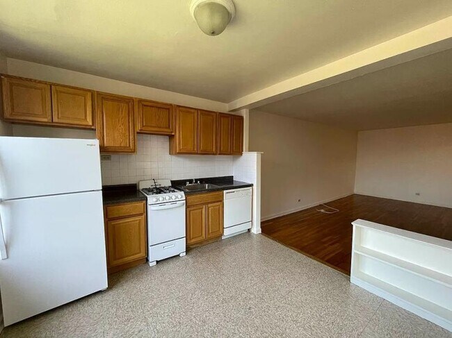 property at 74-10 35th Ave