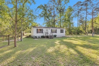 13890 Old Texaco Camp Rd in Conroe, TX - Building Photo - Building Photo
