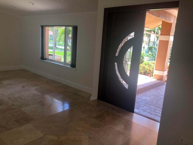 8649 NW 57th Ct in Coral Springs, FL - Building Photo - Building Photo