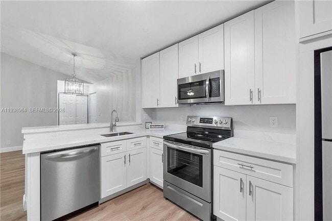 5861 Riverside Dr, Unit 205A2 in Coral Springs, FL - Foto de edificio - Building Photo