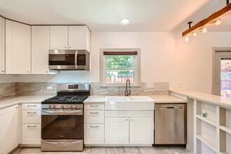 Updated Highland home with mid-century charm in Austin, TX - Building Photo - Building Photo