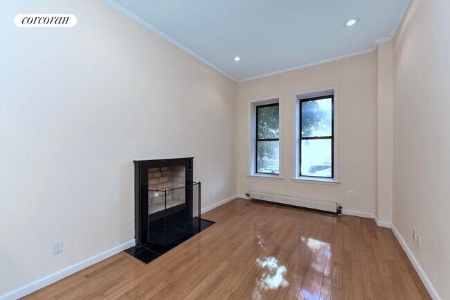 property at 206 E 124th St