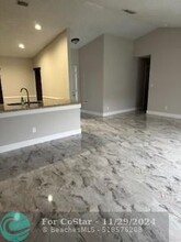 5909 Woodland Point Pl in Tamarac, FL - Building Photo - Building Photo