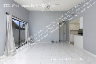3331 Whispering Dr N in Largo, FL - Building Photo - Building Photo