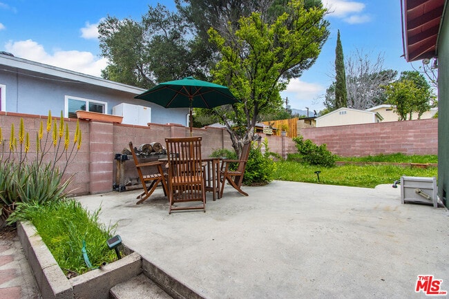 property at 10706 Rhodesia Ave