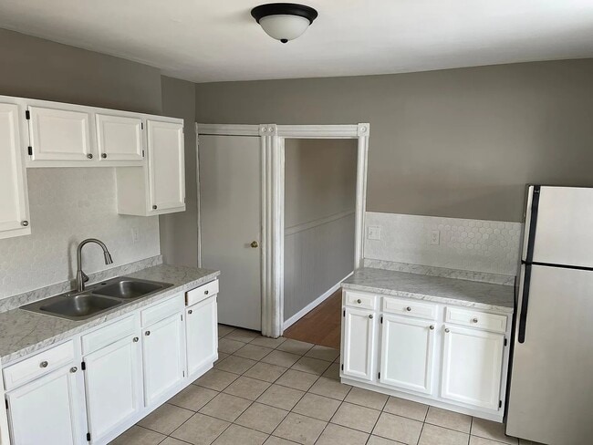 property at 1108 E 3rd St