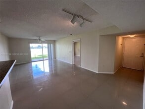 5061 Wiles Rd in Coconut Creek, FL - Building Photo - Building Photo