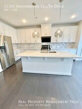 13360 Arrowbrook Centre Dr in Herndon, VA - Building Photo - Building Photo