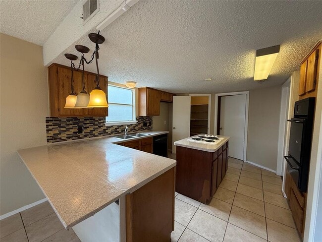 property at 11603 Tanglebriar Trail