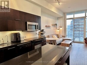 126 Simcoe St in Toronto, ON - Building Photo - Building Photo