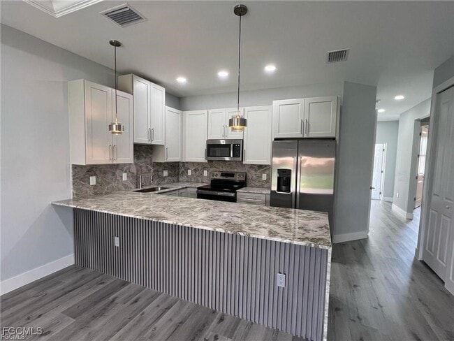 1048 Albert Ave in Lehigh Acres, FL - Building Photo - Building Photo