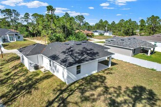 2910 Flora Ave N in Lehigh Acres, FL - Building Photo - Building Photo