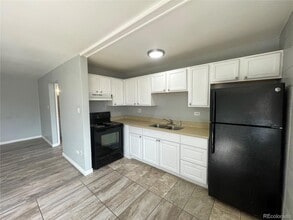 1590 Clinton St, Unit 206 in Aurora, CO - Foto de edificio - Building Photo