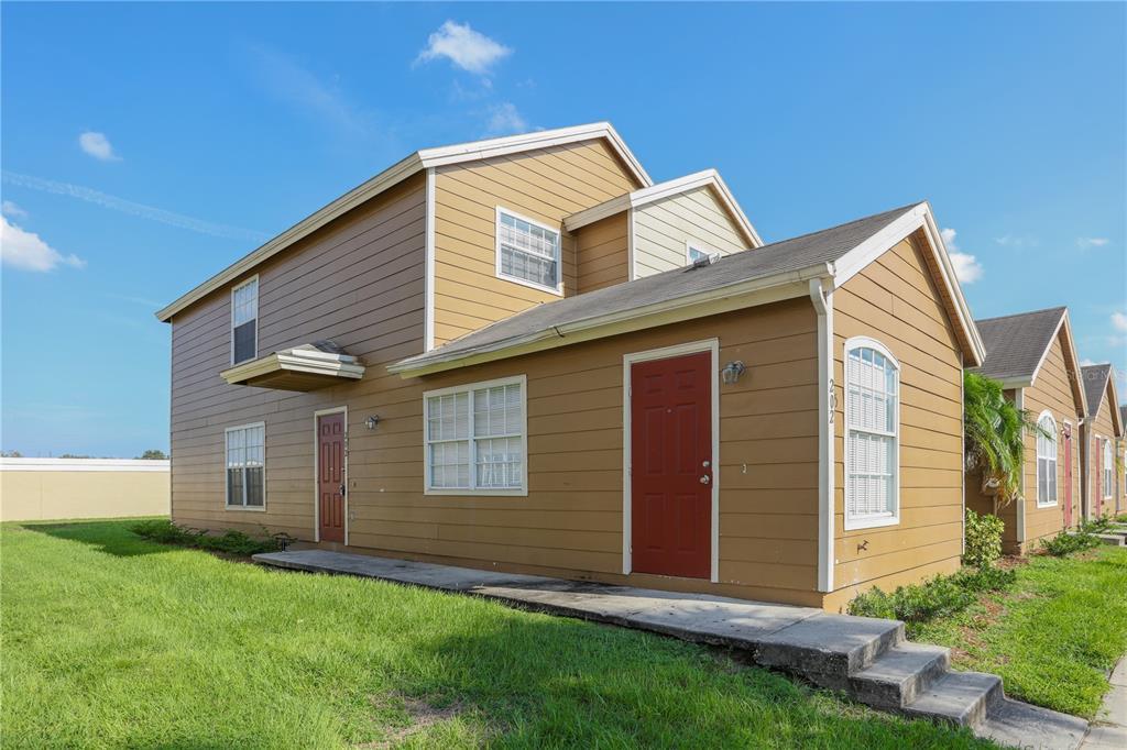 202 Washington Palm Loop in Davenport, FL - Building Photo
