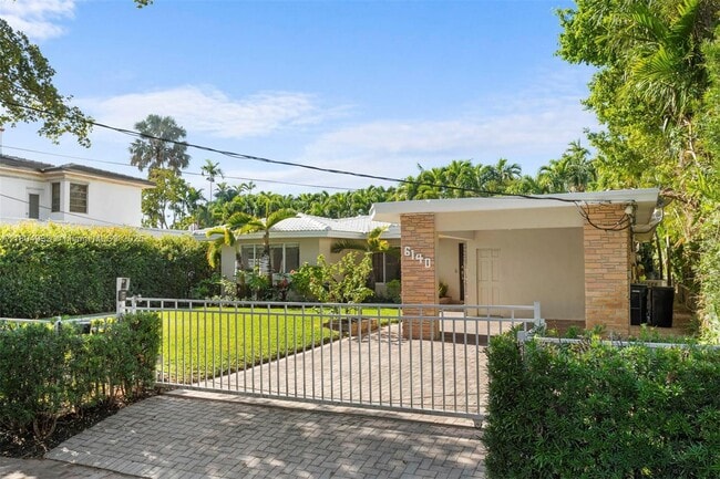 property at 6140 Pine Tree Dr