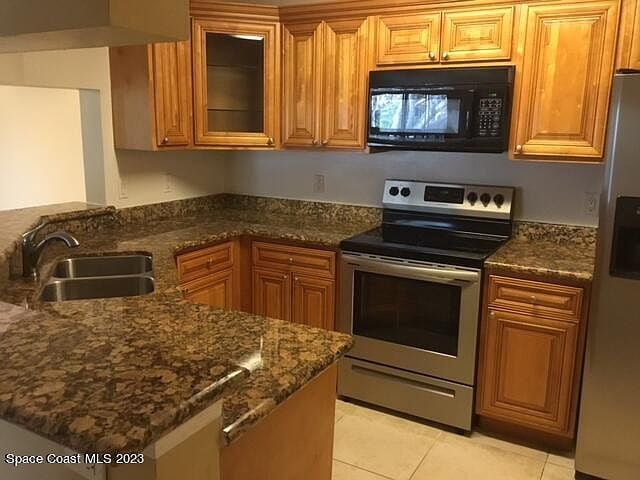 7667 N Wickham Rd in Melbourne, FL - Building Photo - Building Photo