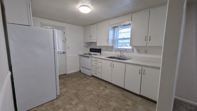 property at 9313 E 18 St S