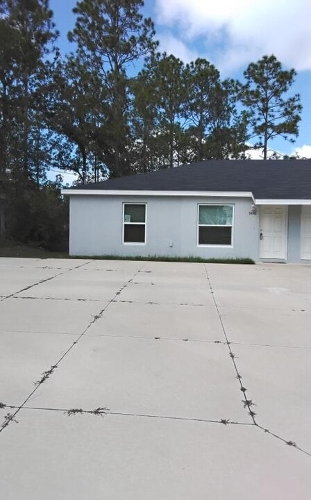 9426 N Manashee Dr in Citrus Springs, FL - Building Photo