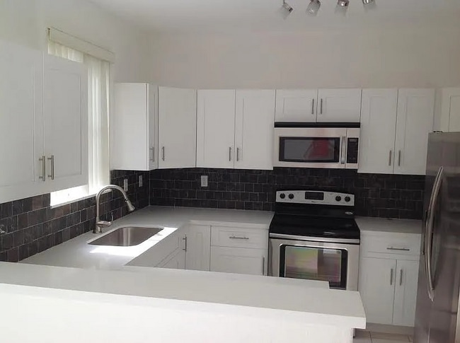 property at 6980 NW 177th St