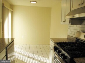 5248 W Running Brook Rd-Unit -103 in Columbia, MD - Building Photo - Building Photo