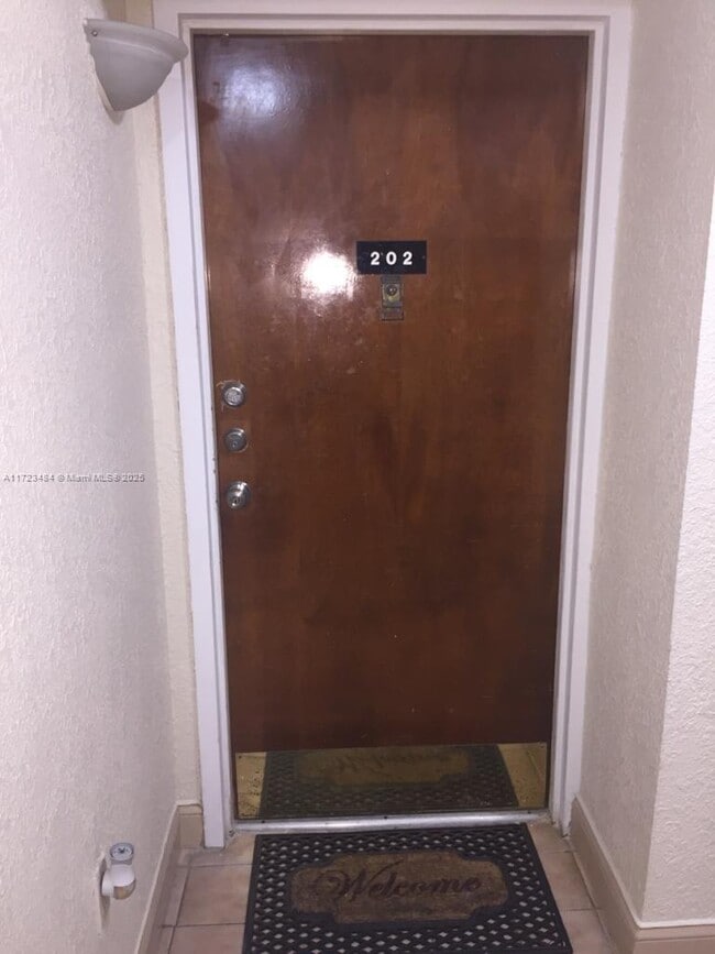property at 6444 Collins Ave