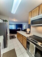 13085 W Cedar Dr in Lakewood, CO - Building Photo - Building Photo