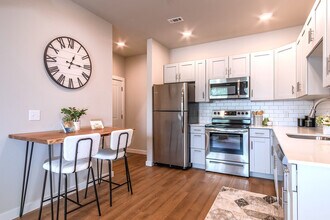 Pure Lowell Apartments in Lowell, AR - Building Photo - Building Photo