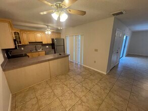 5602 SE Windsong Ln in Stuart, FL - Building Photo - Building Photo