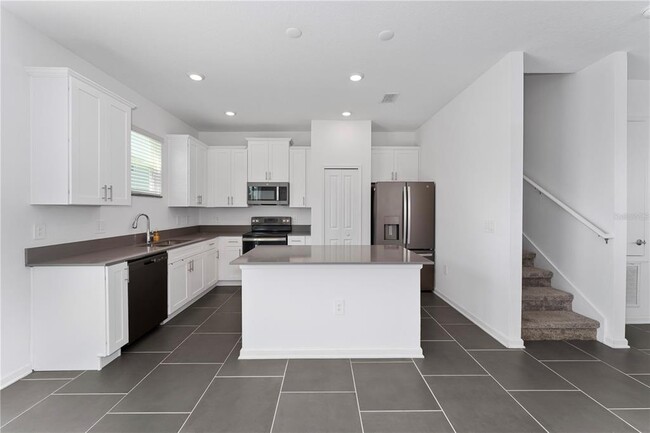 7728 Stone Crk Trl in Kissimmee, FL - Building Photo - Building Photo