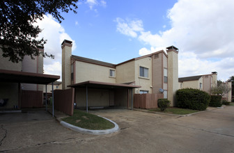 Ambiance Townhomes in Houston, TX - Building Photo - Building Photo