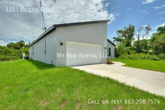 1251 Dustin Rd in North Port, FL - Building Photo - Building Photo