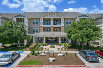 Mariposa at Bay Colony 55+ Apartments in Dickinson, TX - Building Photo - Building Photo